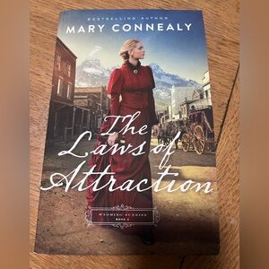 The Laws of Attraction Paperback - Red Dress Cover